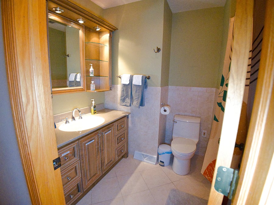 Our private full bathroom is clean, spacious, and stocked with essentials for your convenience. Featuring a shower, fresh towels, and toiletries.