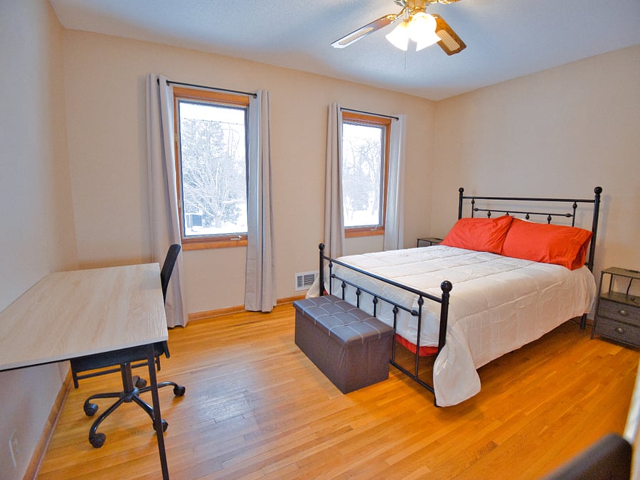 Welcome to your perfect getaway! This charming bedroom offers a cozy full bed, plush linens, warm decor, and plenty of natural light. Perfect for work or leisure, it's a serene retreat with all the essentials for a restful stay.