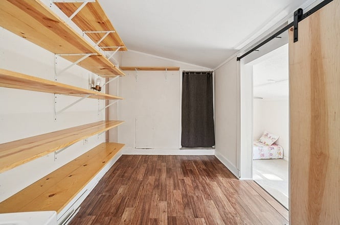 Note: This photo shows a different bed in bedroom at right. See other photos for current furniture in this bedroom.