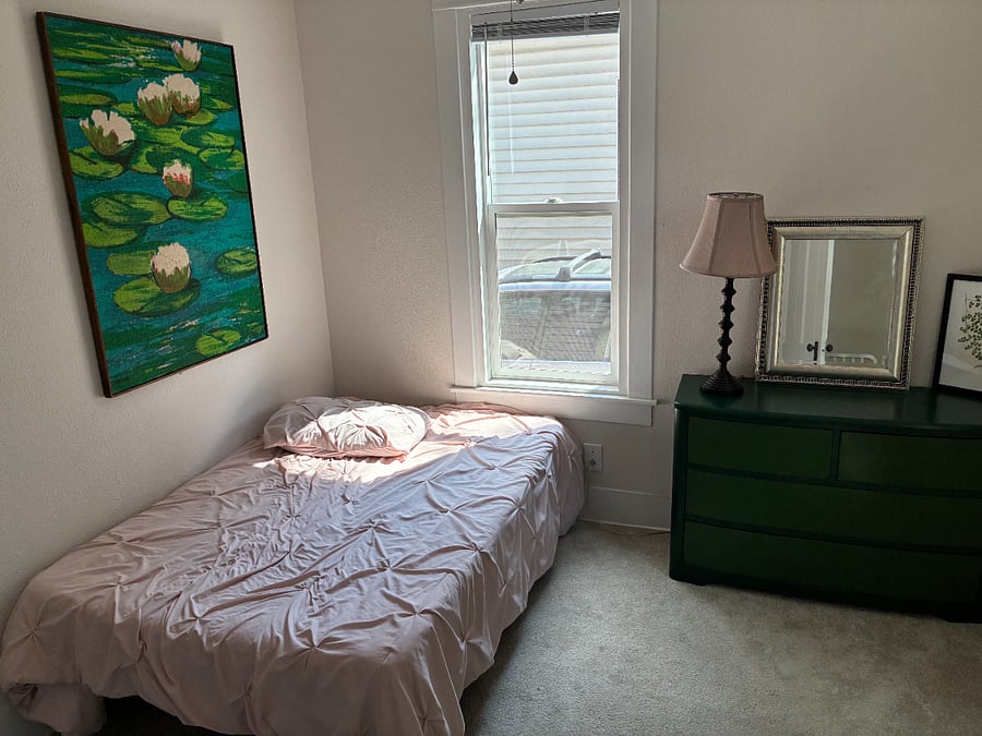 Bedroom 1, front of house. Has a closet not shown in this photo.
