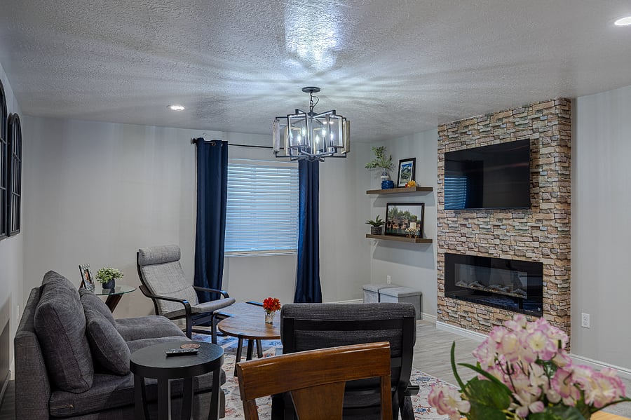 Basement family room with electric fireplace