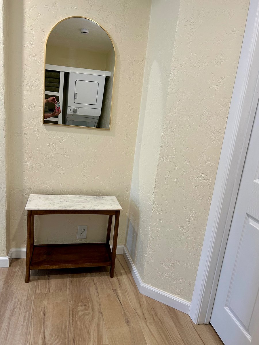 Hallway adjacent to laundry space
