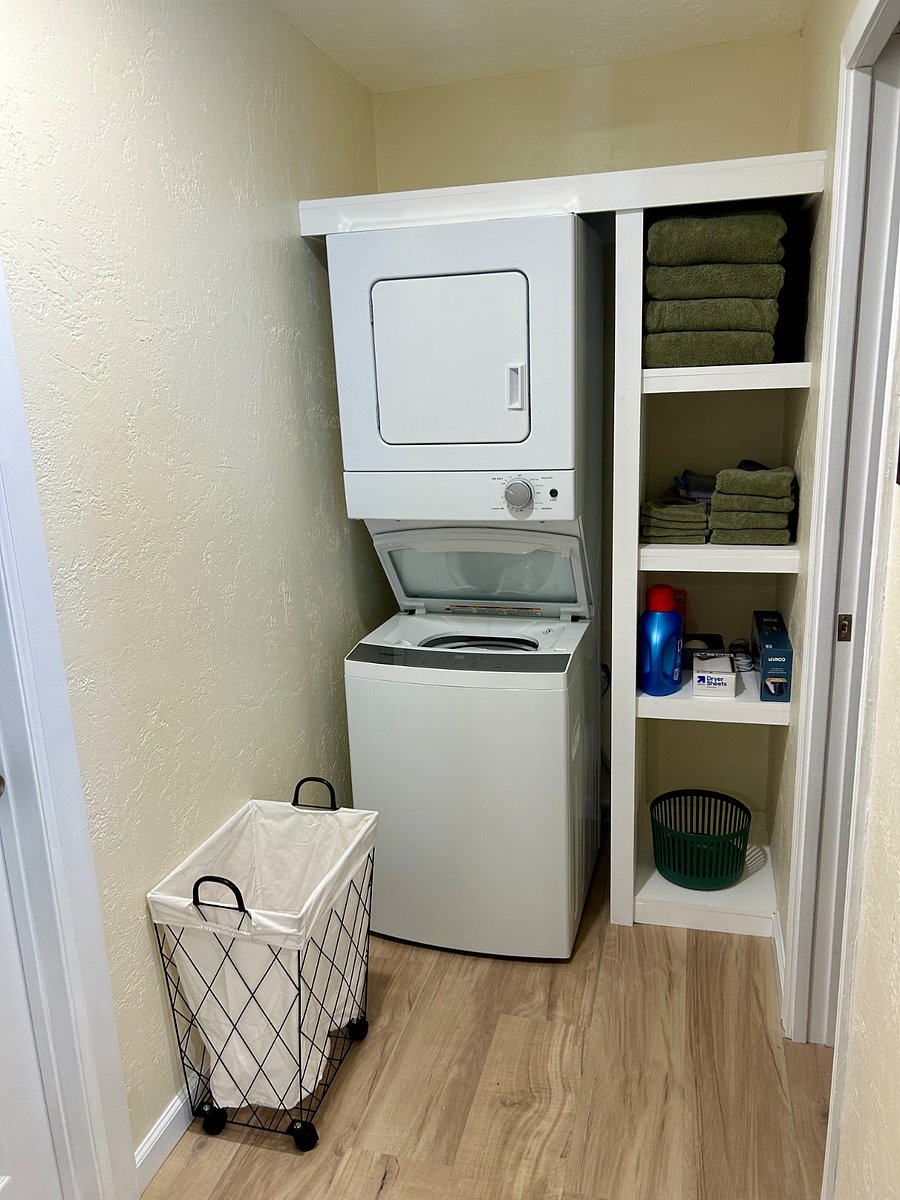 laundry space and shelves
bathroom is to the right