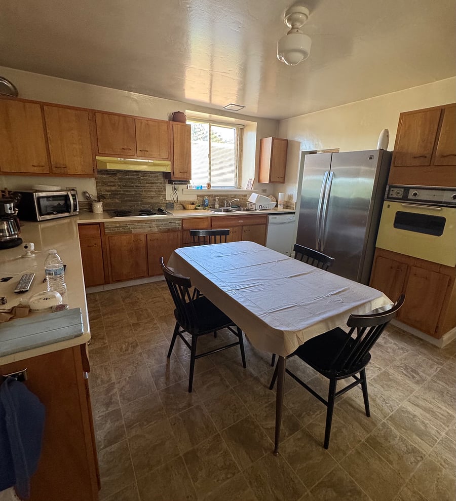 Kitchen, full size refrigerator, stove, oven, microwave, dishwasher, pantry, pots and pans, dinnerware, utensils.