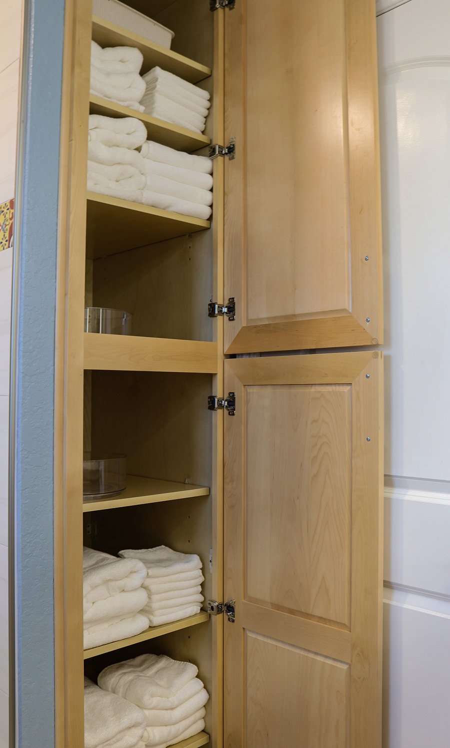 Bathroom storage for toiletries, towels, washclothes and bath mats