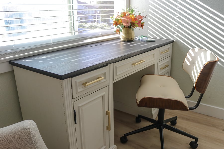large desk with built in outlets for all your electronics