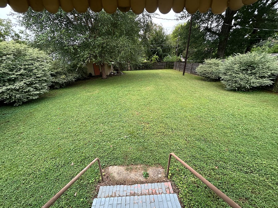 Fenced backyard. Lawn care and Pest Control are serviced and paid by property owner.
