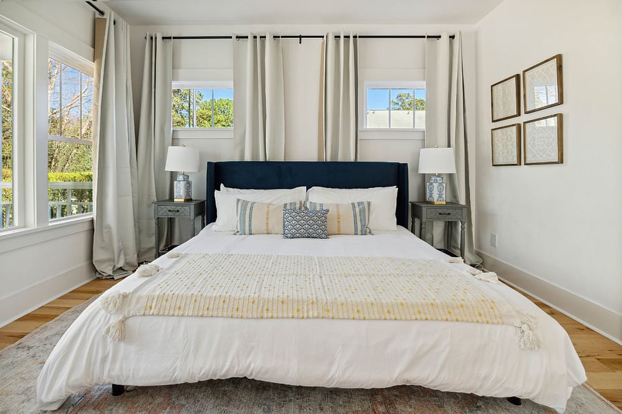 first story primary suite, king sized bed