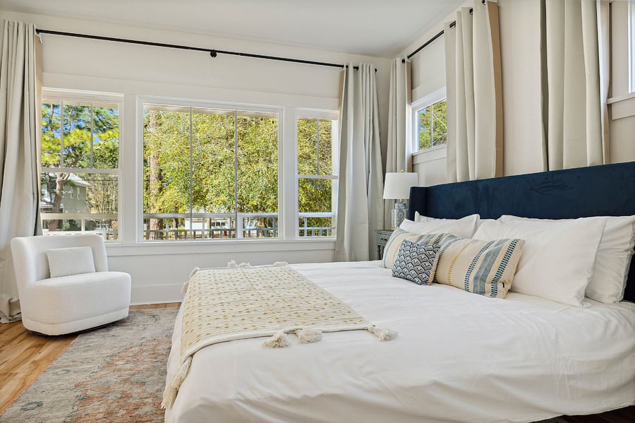 first story primary suite, king sized bed