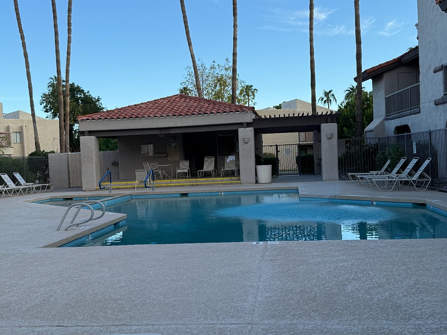 Pool with poolside grills for outdoor BBQ or just lounging.