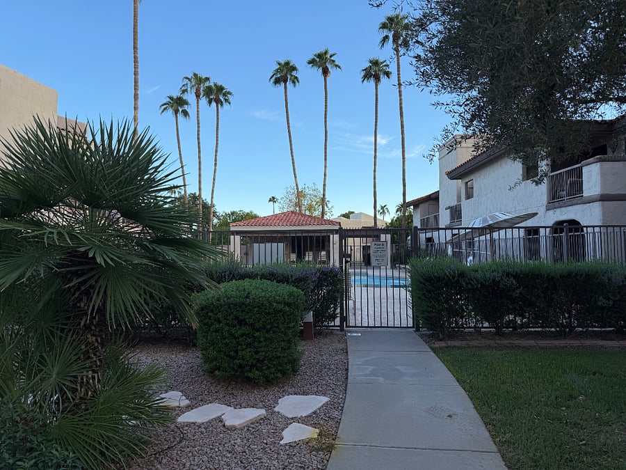 Gated pool access along well maintained walkways.