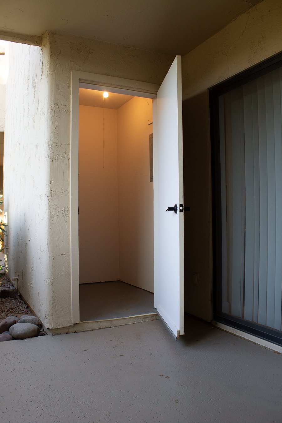 Additional storage closet off back patio for luggage, tools, sporting equipment or other occasional use items.
