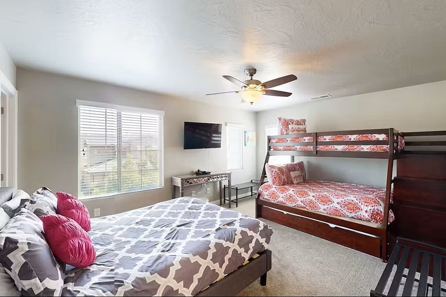 Bedroom #2 featuring 1 Queen and bunk bed (twin over full, with additional twin pull out.)