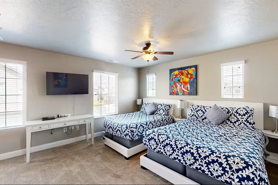 Bedroom #1 featuring 2 Queens and bunk bed (twin over full, with additional twin pull out.)