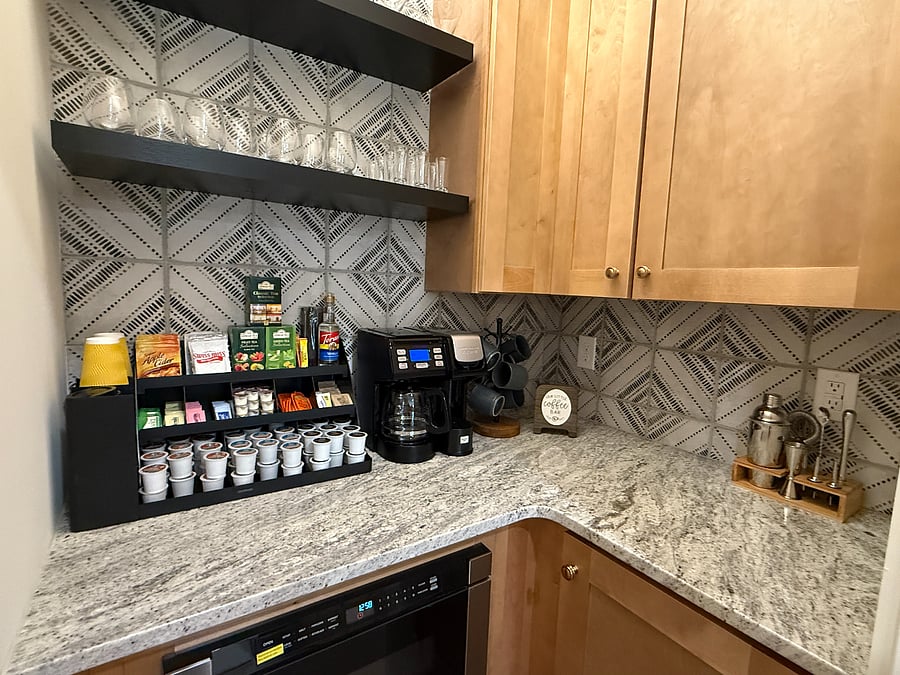 Butler pantry with drawer microwave and plenty of beverage choices... coffee, tea and service for adult beverages.