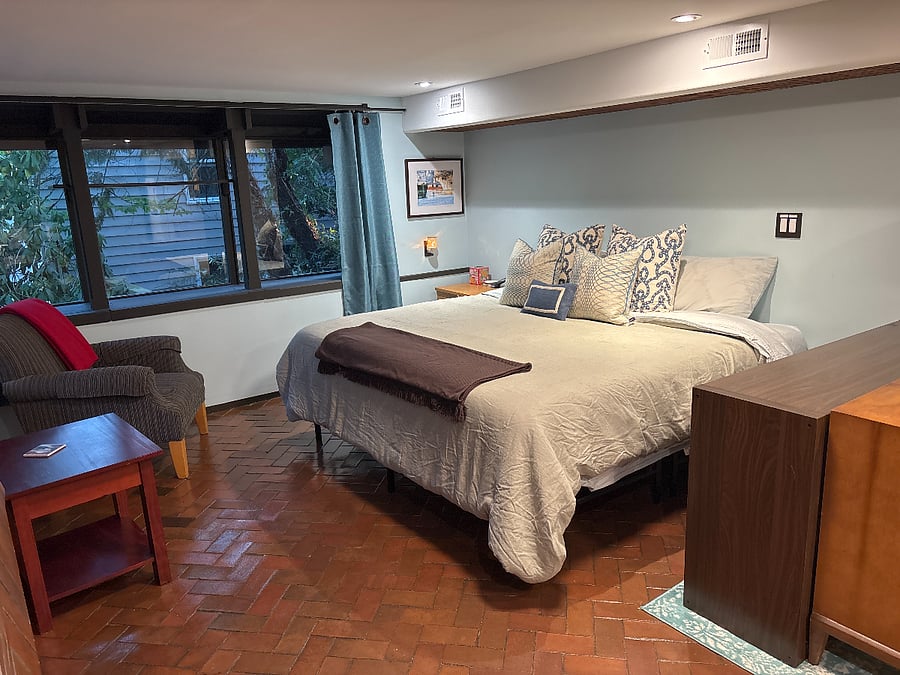 King-size bed with task lighting and dimmers