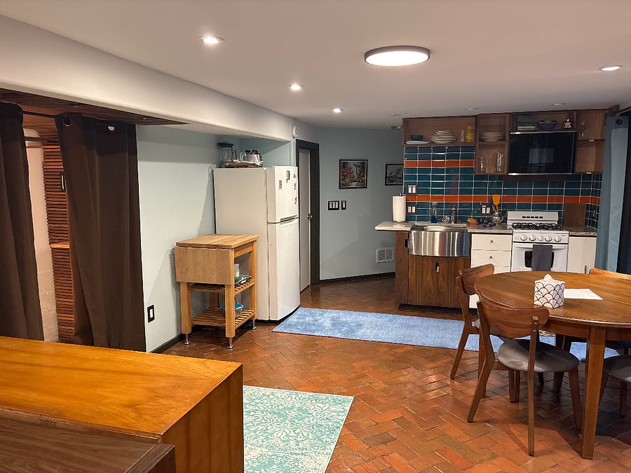 Kitchen has full fridge, gas range with 4 burners, mw, huge sink