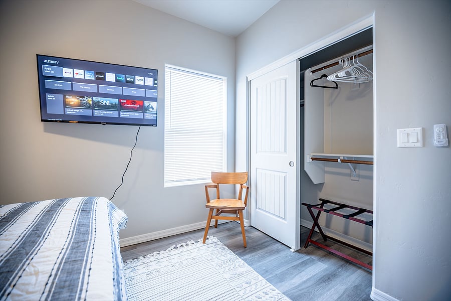 Bedroom #2 closet has luggage rack for convenience