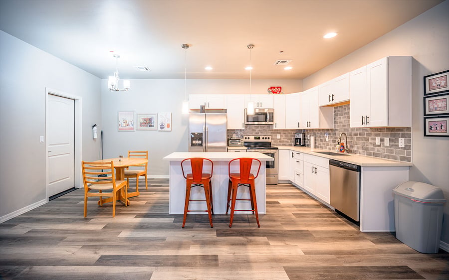 Modern open concept kitchen with basic amenities supplied