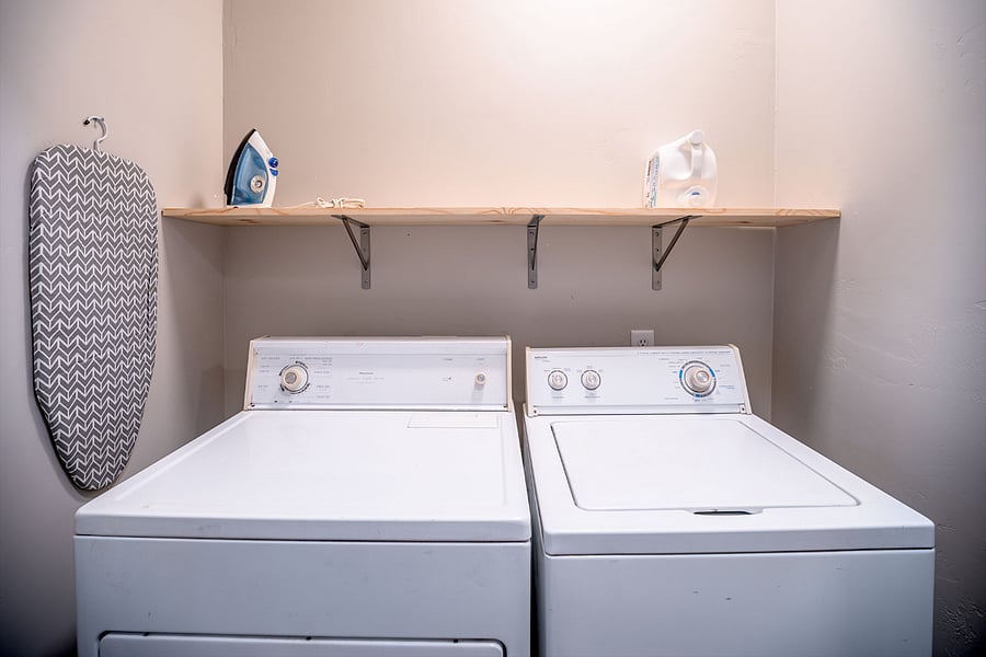 Laundry with washer, dryer, iron and ironing board