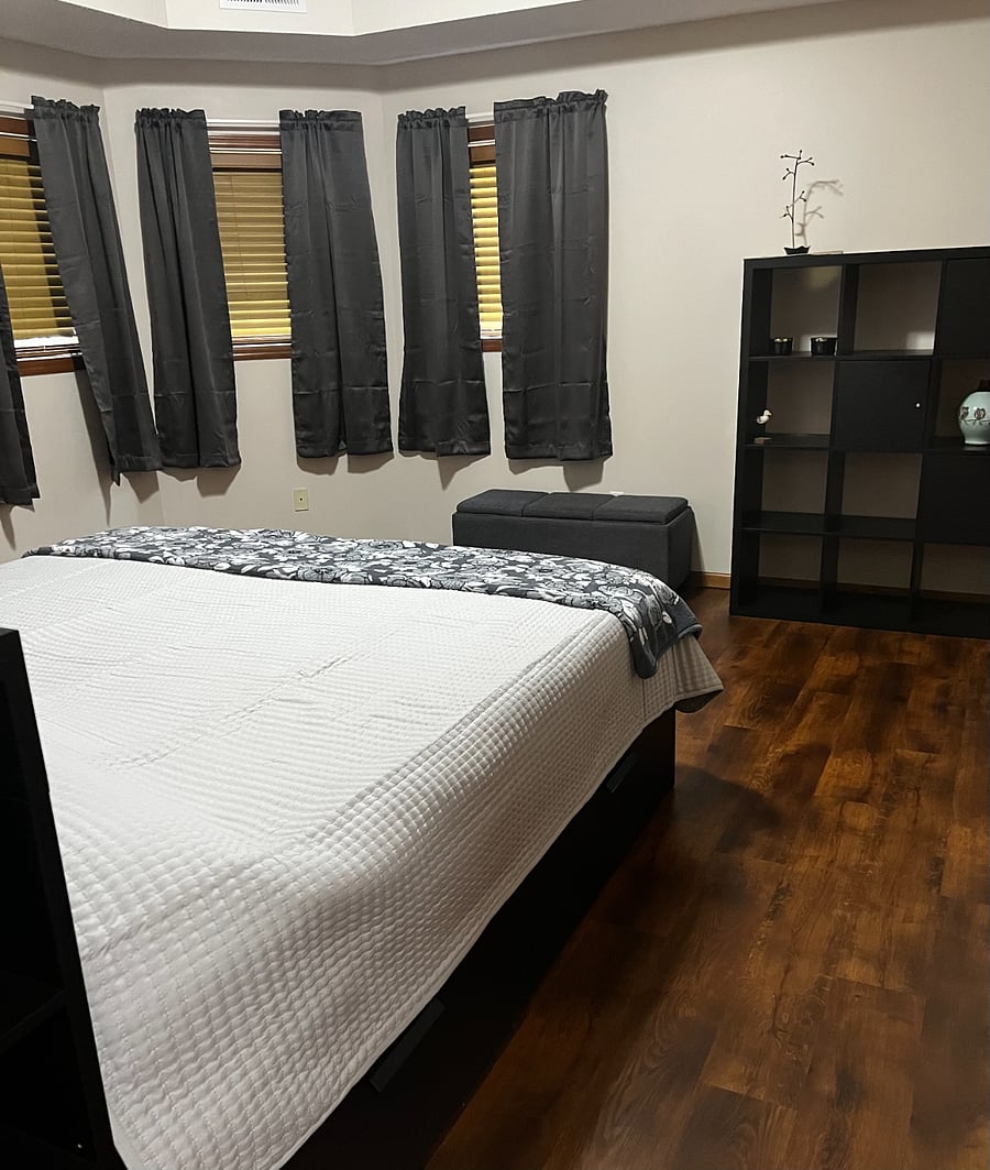 King-sized bed; black-out curtains.
