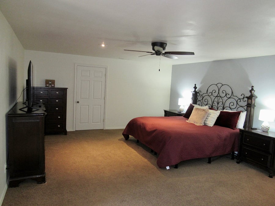 The spacious Master Bedroom features a split-king adjustable bed, a large walk-in closet, a TV (with soundbar)The spacious Master Bedroom features a large walk-in closet, a TV, an reading nook and a vanity. A portable AC unity is available in the summer months.