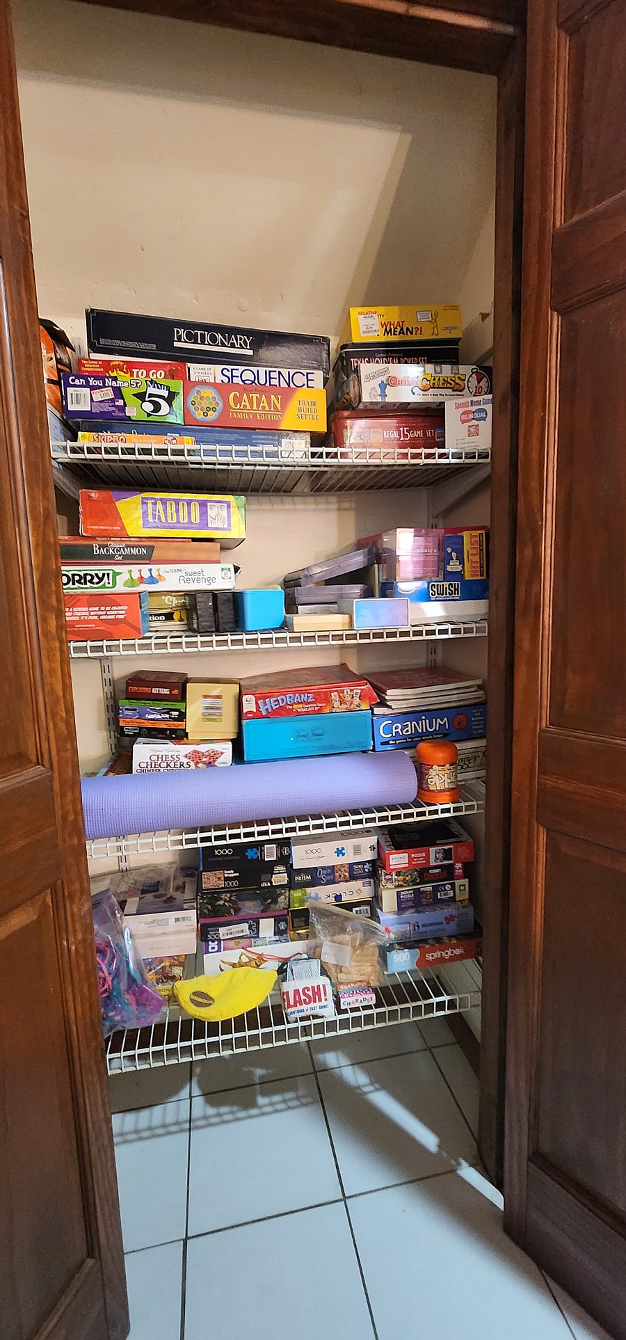 Huge "old skool" game closet with board games, puzzles, crafts, a yoga mat and more!