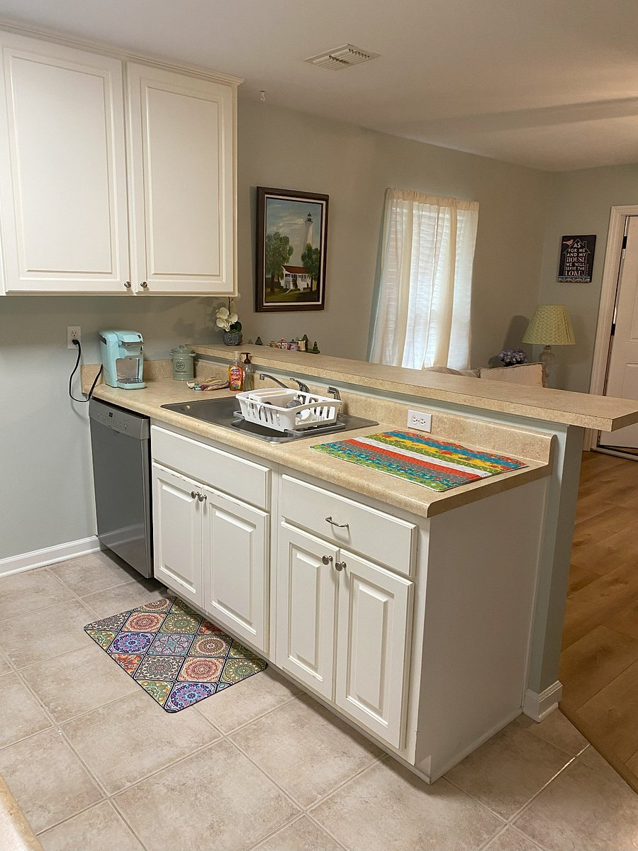 Kitchen with dishwasher, lots of cabinet storage