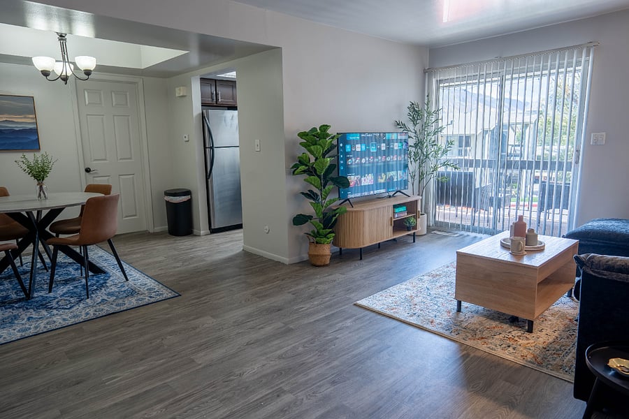 Spacious entry way flowing into living and dining rooms with open concept.