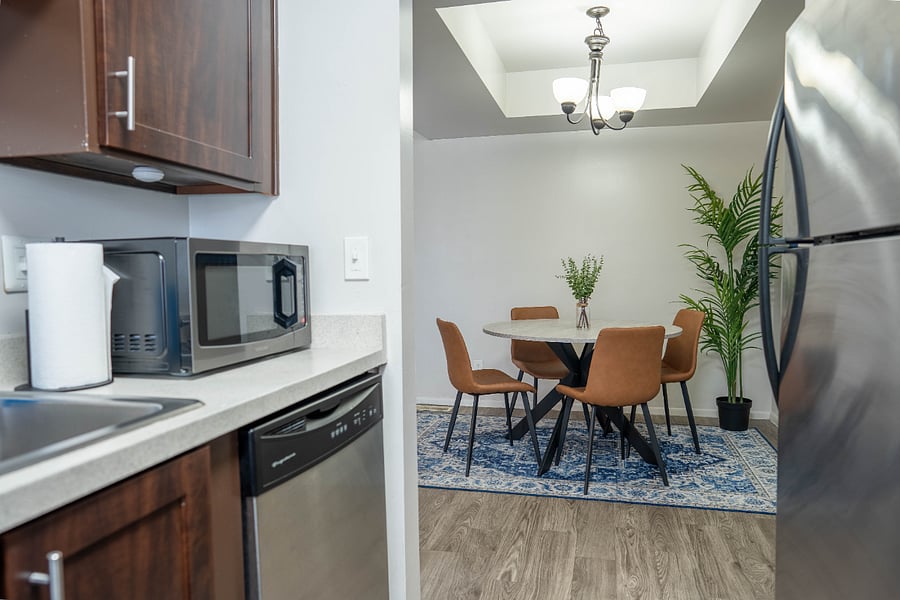 Kitchen with natural flow into dining room.