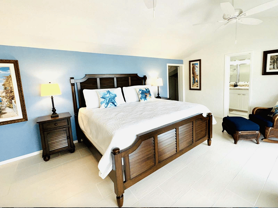 Primary king bed suite on second floor with walk in bathroom and walk in closet.  Work desk in this room.  