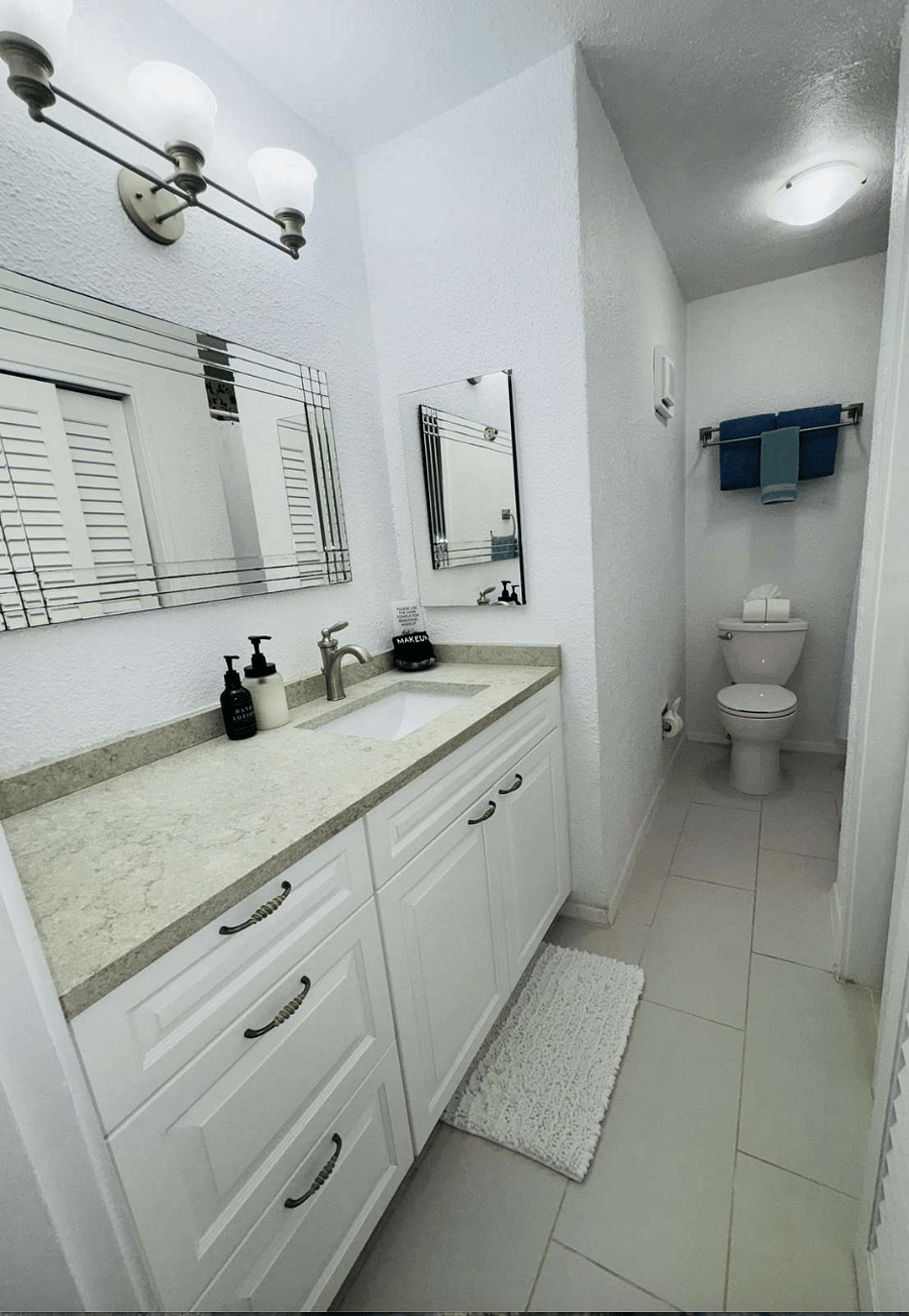 En suite bathroom to garden room with fully remodeled walk in shower.  