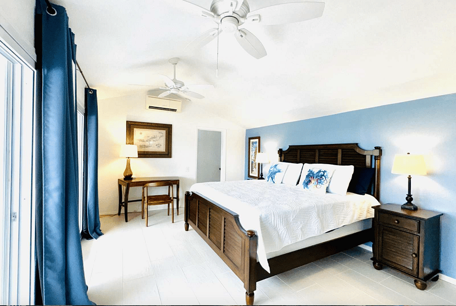 Upstairs primary suite king bed with large walk in closet and work desk.  All rooms come equipped with blackout curtains.  