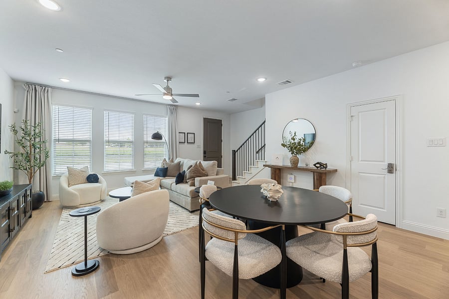 View of the spacious living room / breakfast room combo with lots of seating.