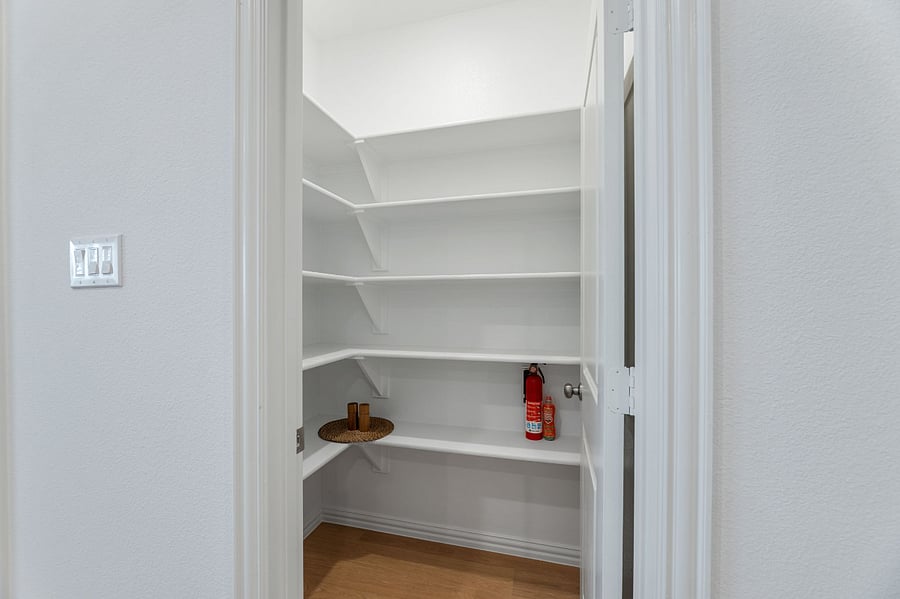 Large walk-in pantry with plenty of space.