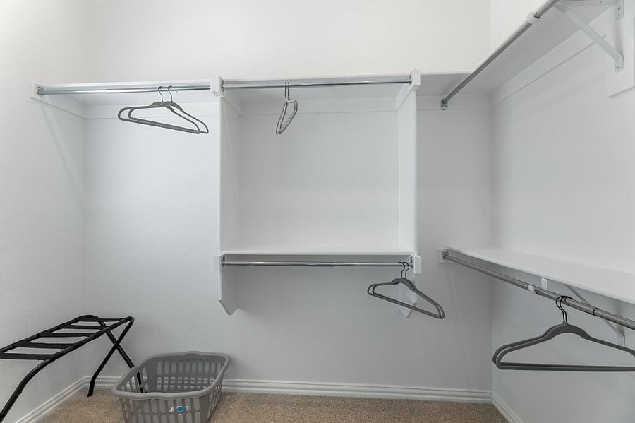 Spacious walk-in "His" Master closet.