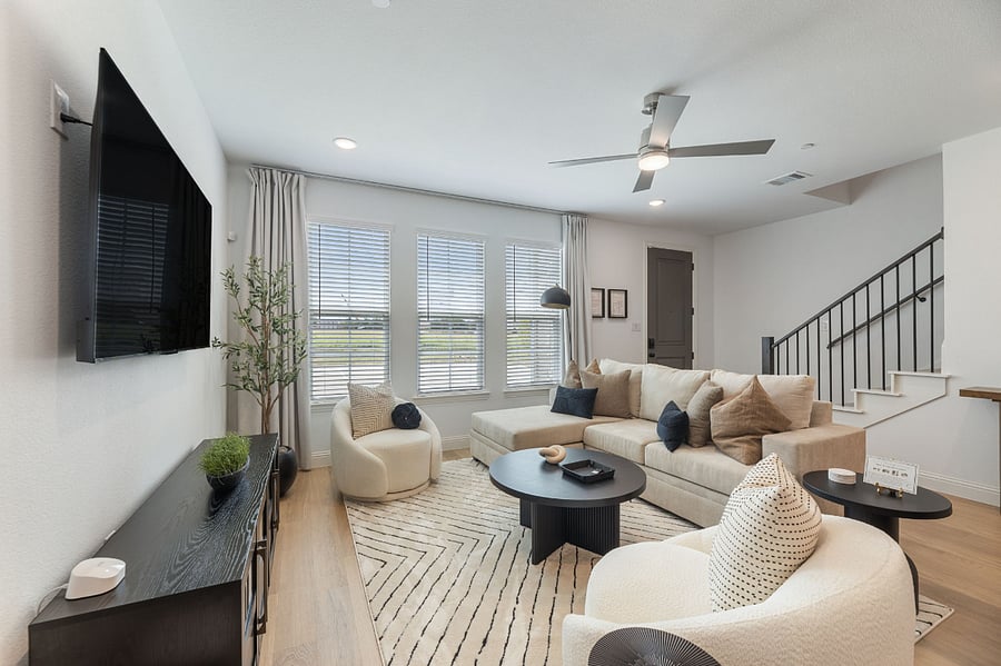 Comfortable and luxurious living room with 65" HGTV and Queen Sleeper sectional with memory foam mattress.