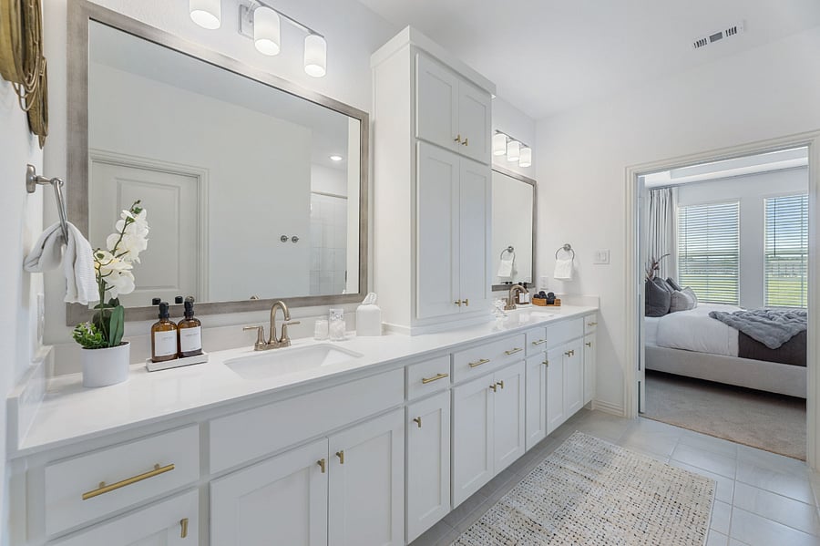 Luxurious Master bath with lots of storage and dual vanities. Cleaning supplies, a hairdryer and lighted vanity mirror provided, along with expanded essentials: cotton pads, Q-tips, Kleenex tissue, shower caps and makeup removing pads.