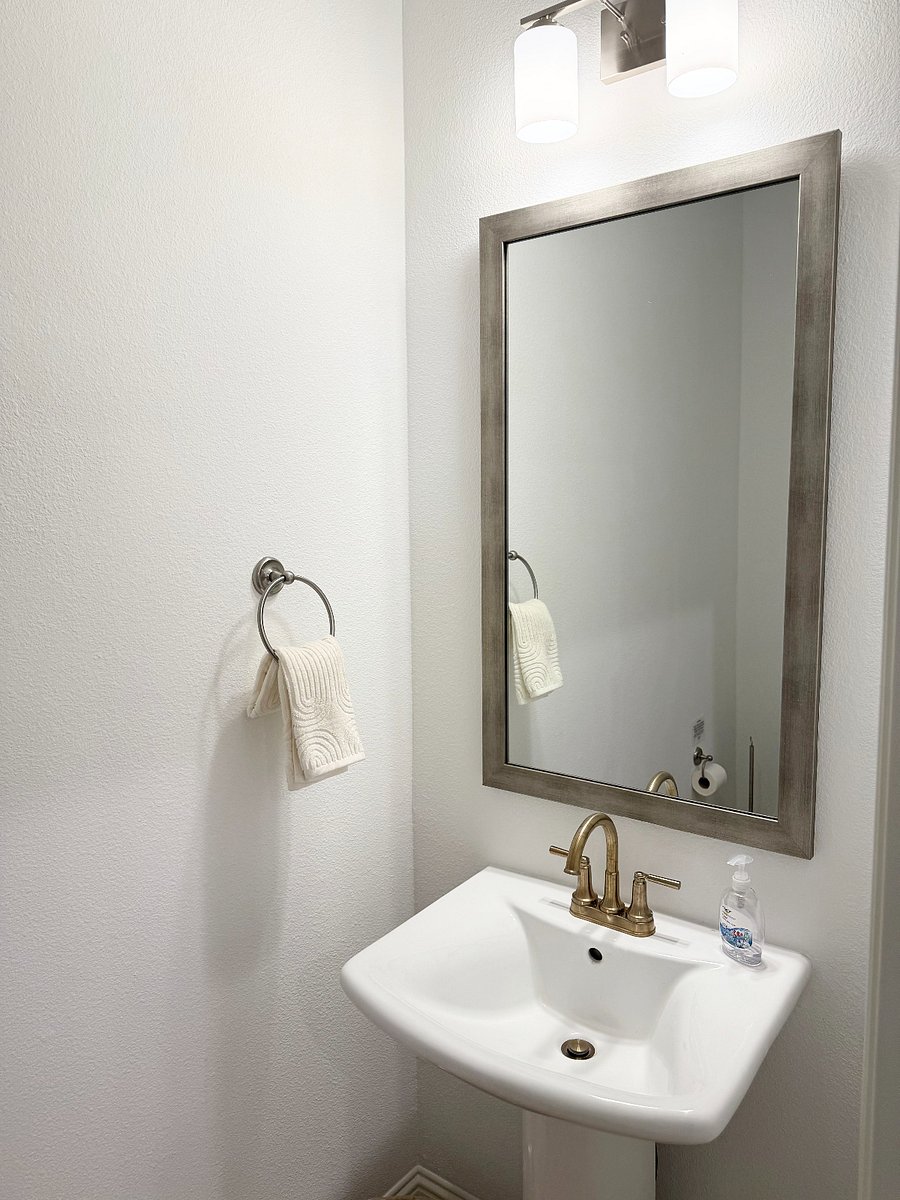 Half Bath with pedestal sink.