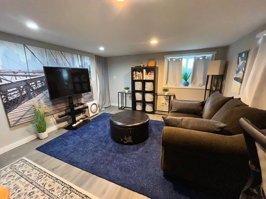 Living room with smart tv and desk