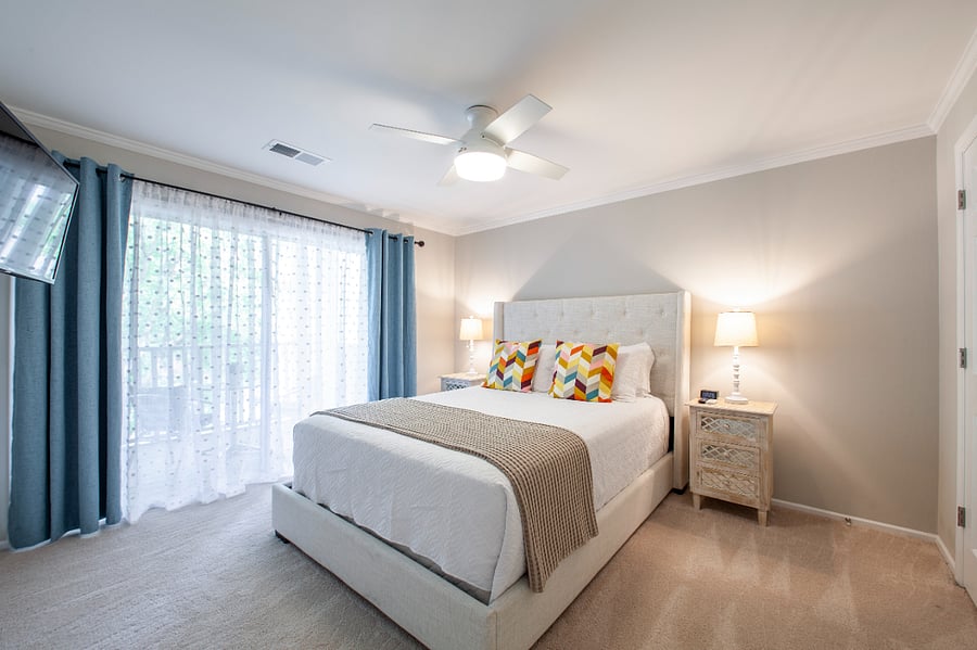 Bedroom with Smart TV and comfy queen size bed with luxurious linens (extra sets provided)