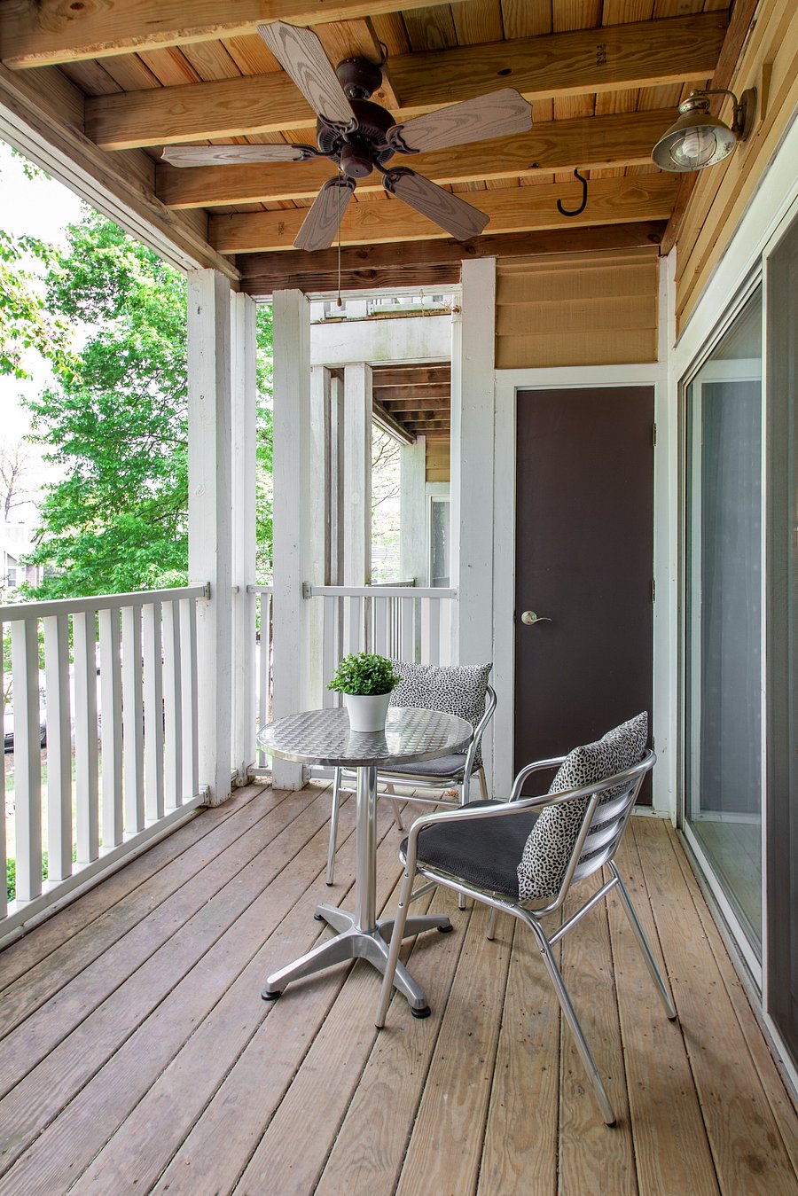 Private balcony overlooking a creek and wooded area - accessible from the bedroom or living area.