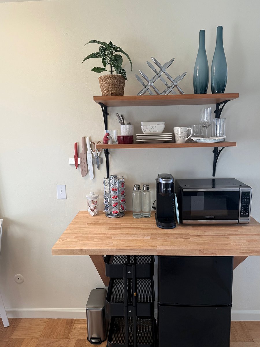 Keurig coffee maker, microwave and basic kitchen supplies