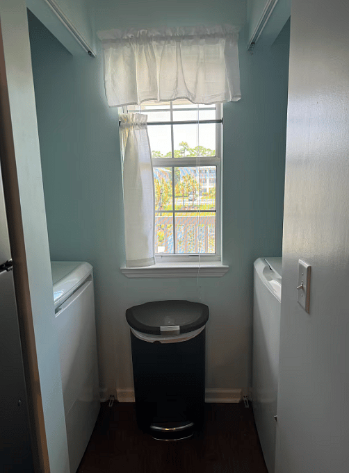 Washer, Dryer and extra storage- bifold doors have been added for sound and esthetics.