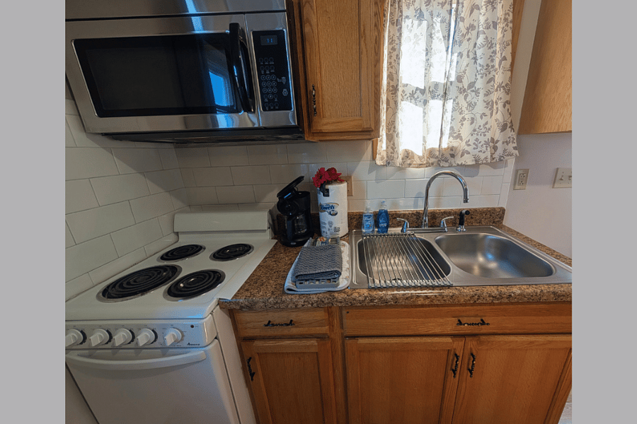 microwave, stove. oven, 5 cup coffee maker, toaster, dishes, silverware. pots and pans in guest house.