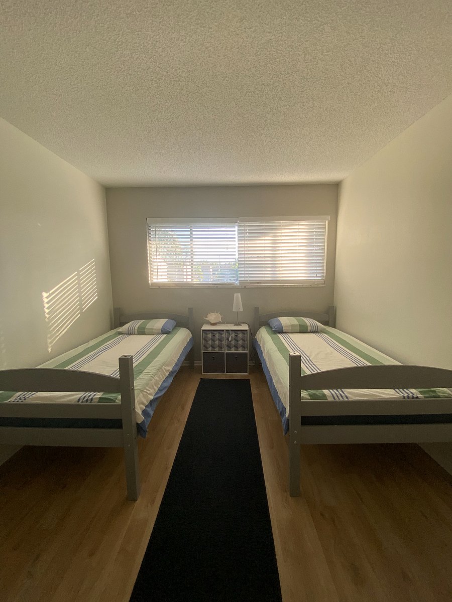 2 twin size beds that can bunk up or separate with closet