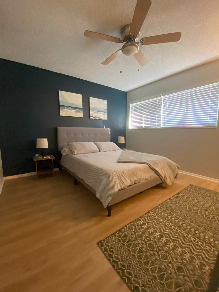master bedroom with queen bed