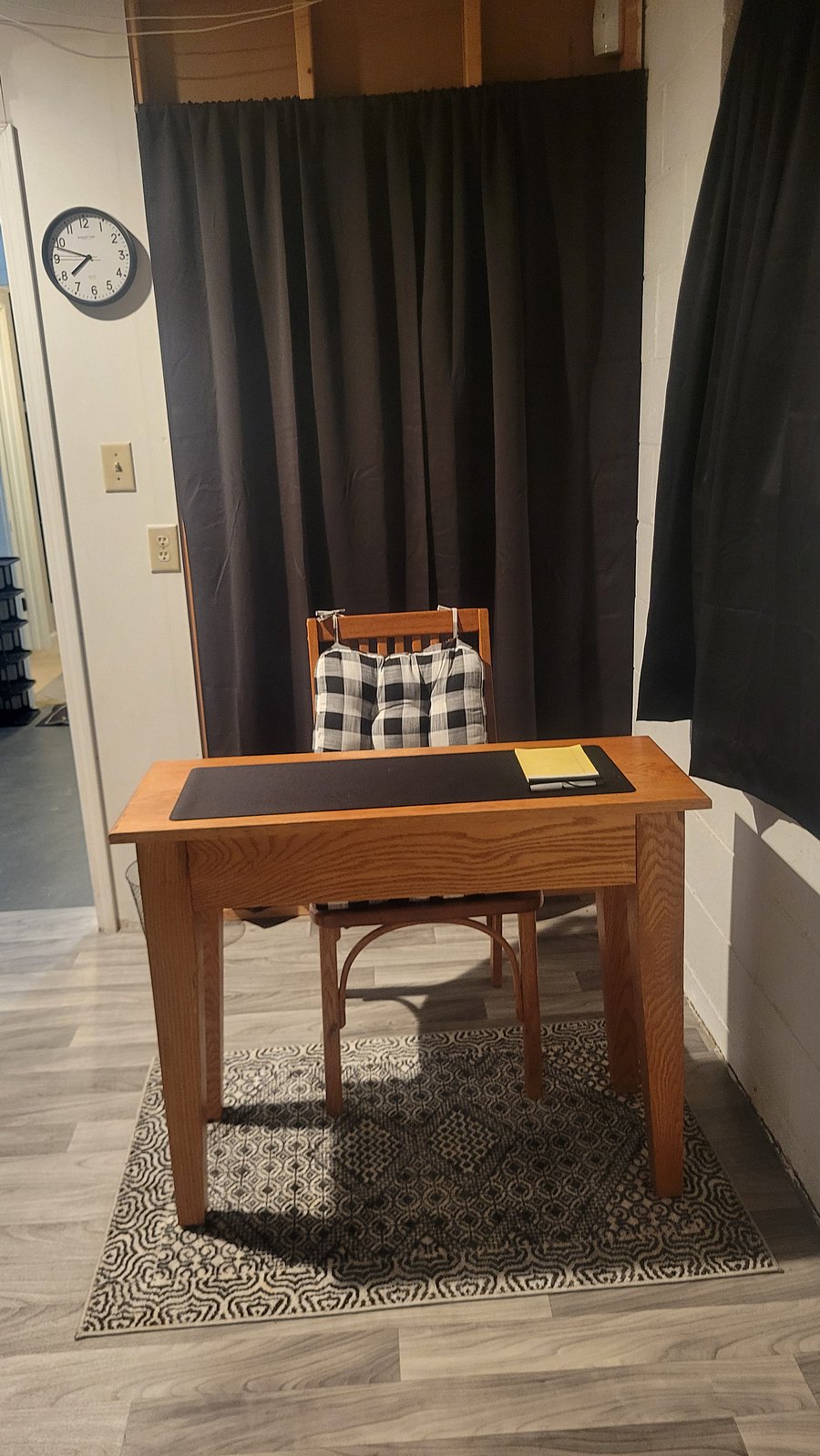 Designated workstation in entryway.