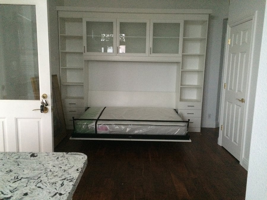 Full size Murphy bed with storage and closet (right hand side door)