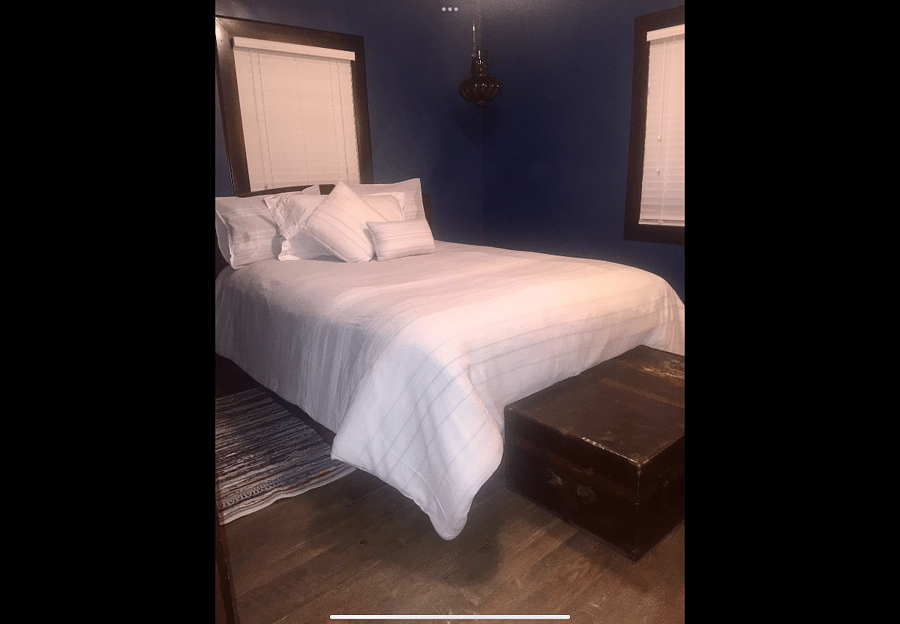 This is the smaller bedroom of the two which has a queen size bed.